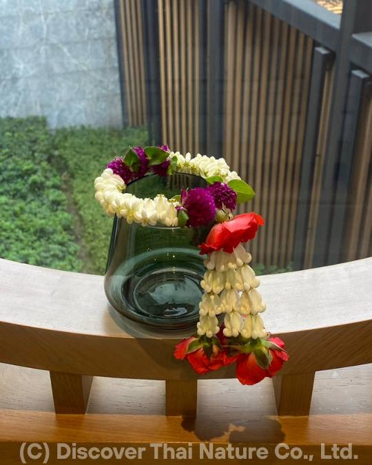 Traditional Thai flower garland made with jasmine and orchids